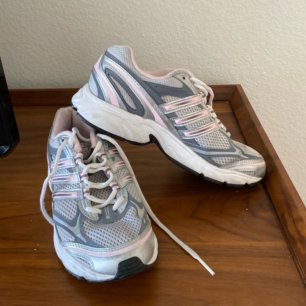 Adidas Torsion System walking shoe.